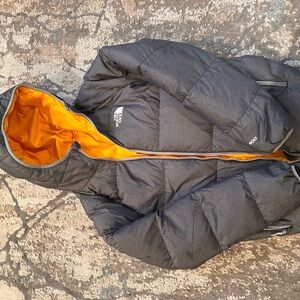 The North Face Kids Charcoal lightweight Puffer with Bright Orange Hood